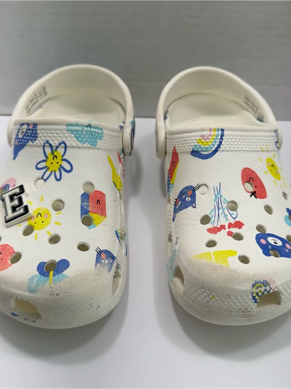 Crocs Kids' Classic Doodle Print Clogs, White & Multicolor Whimsical Pattern J1